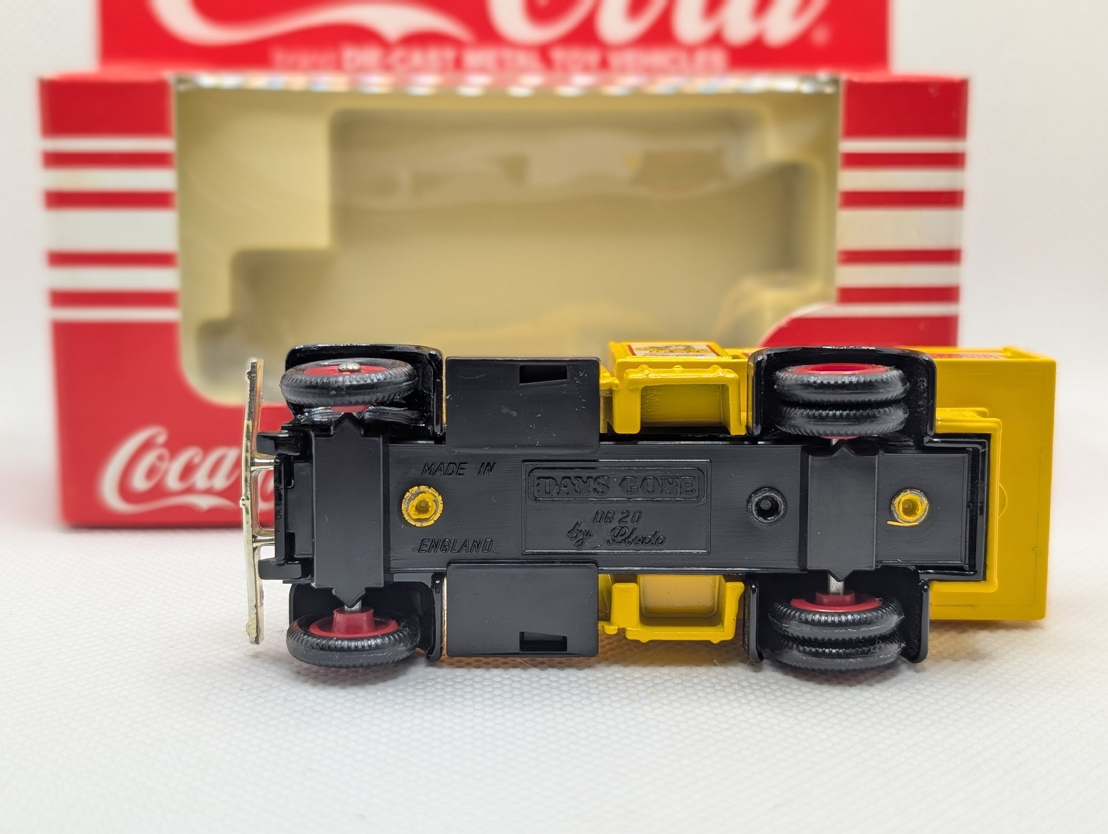 Lledo Days Gone DG20 Ford Model A Stake Truck - Coca-Cola Yellow with Red Barrels (Boxed)